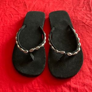 Black comfortable flip flops w/ silver ornament straps on top never worn size 10